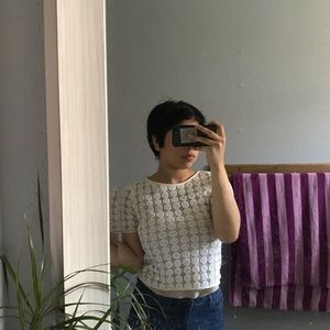 white blouse, 3 inch zipper in the upper back.